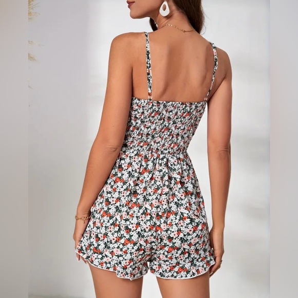 NEW Flirty Floral Print Romper Jumpsuit With Cut out Detail Chic-Knotted Front. - Picture 2 of 5